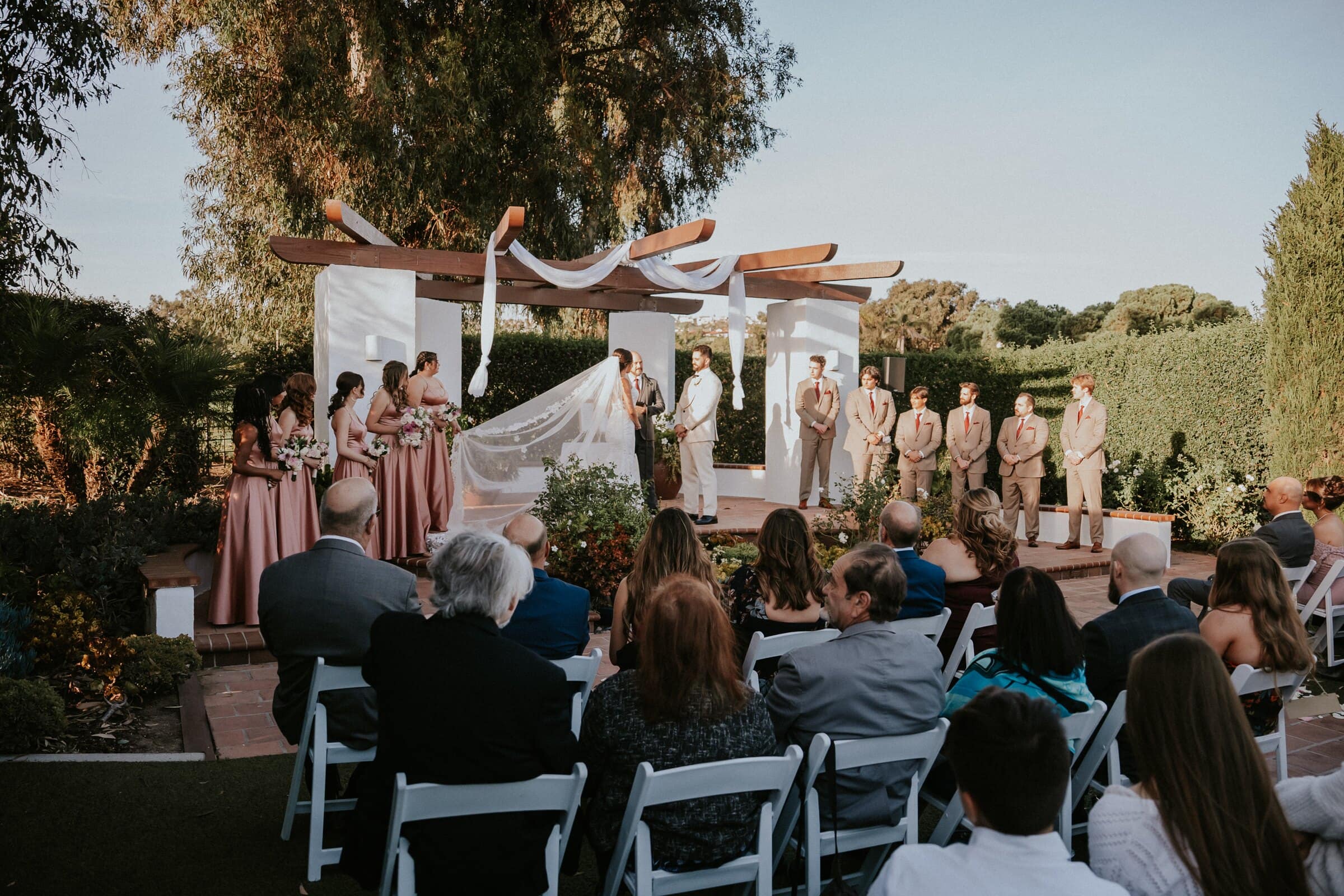 The garden ceremony seen from behind the guests