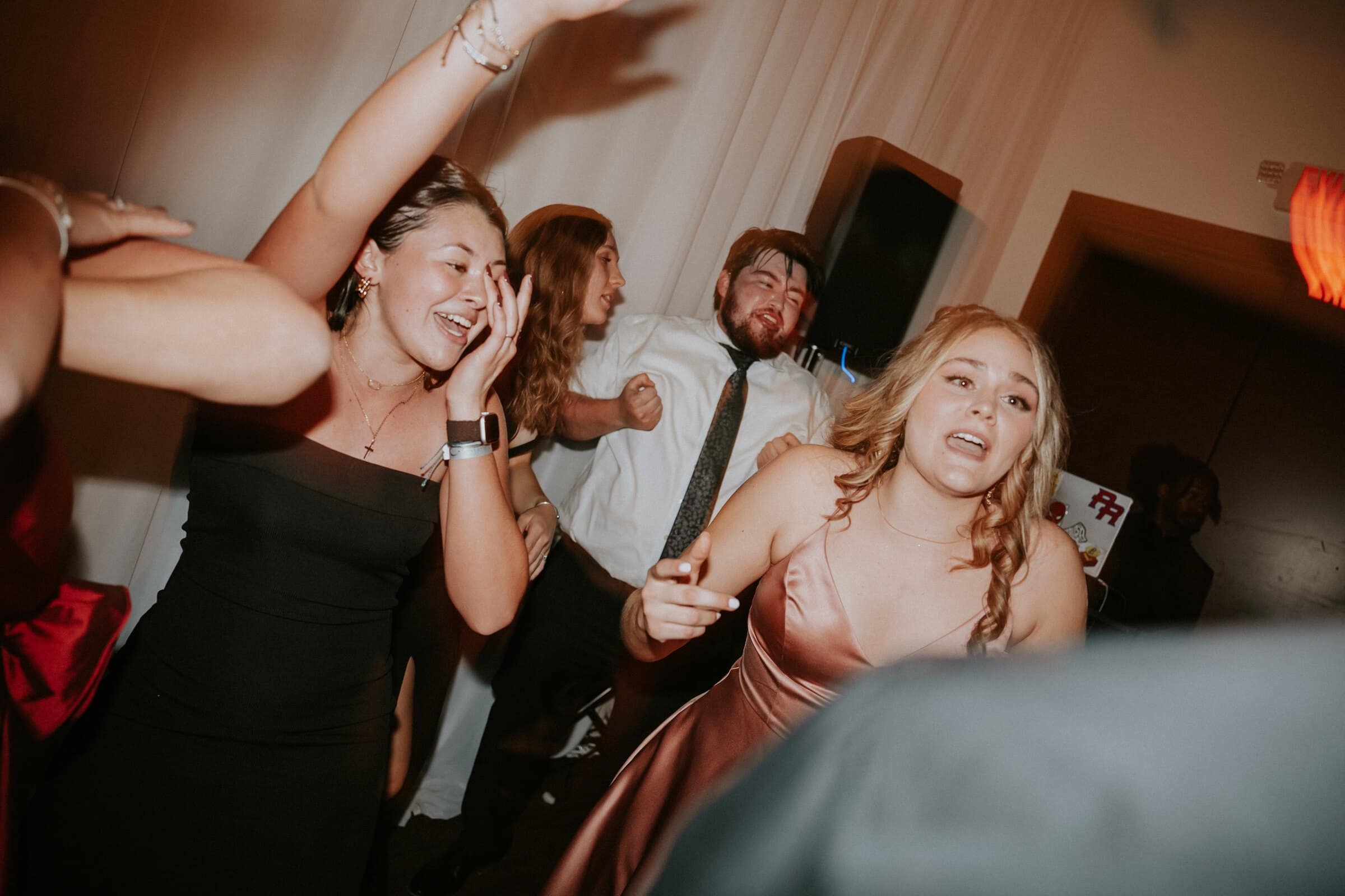 Bridesmaids dancing at the reception