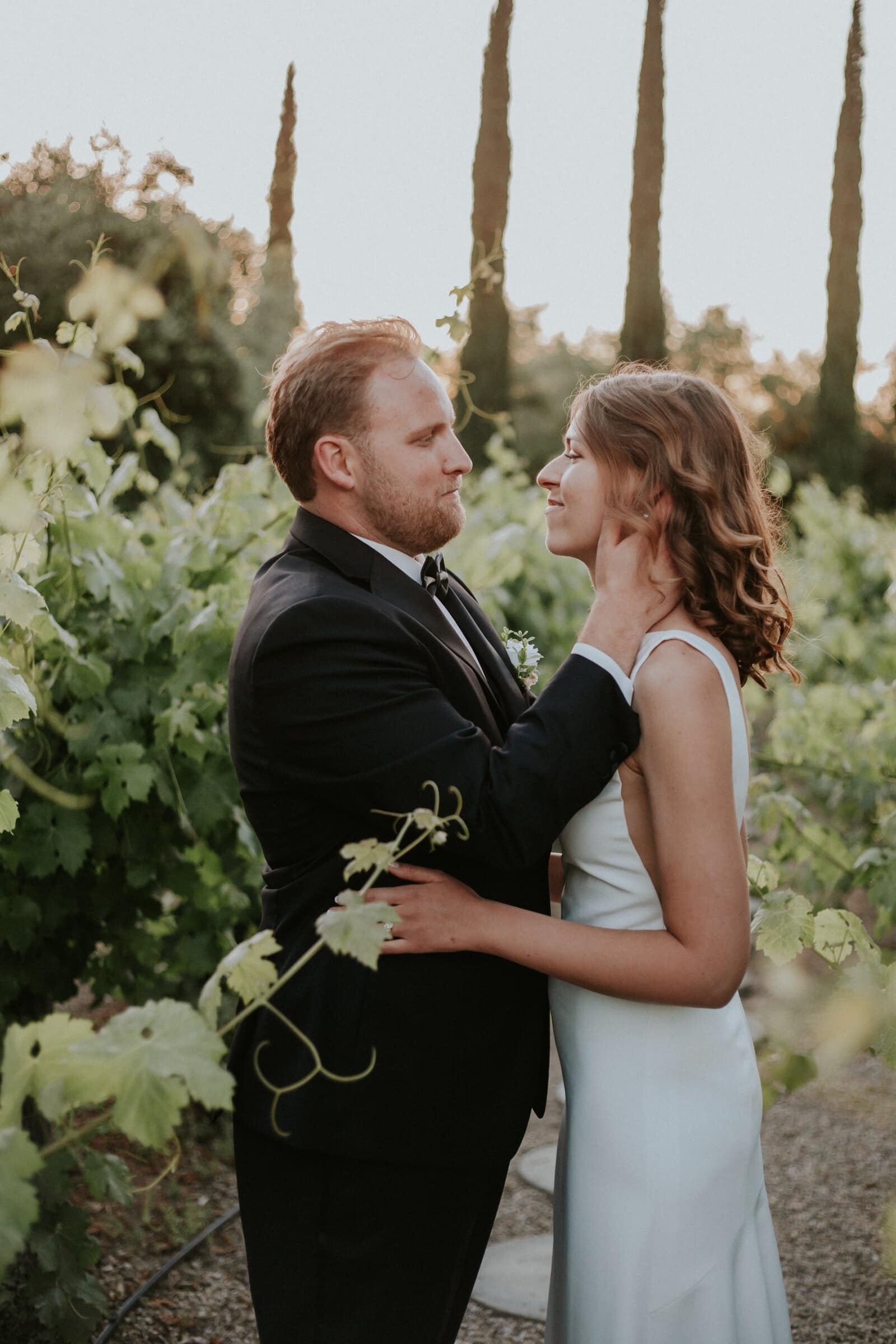 Blake and Ava face to face in the vineyard