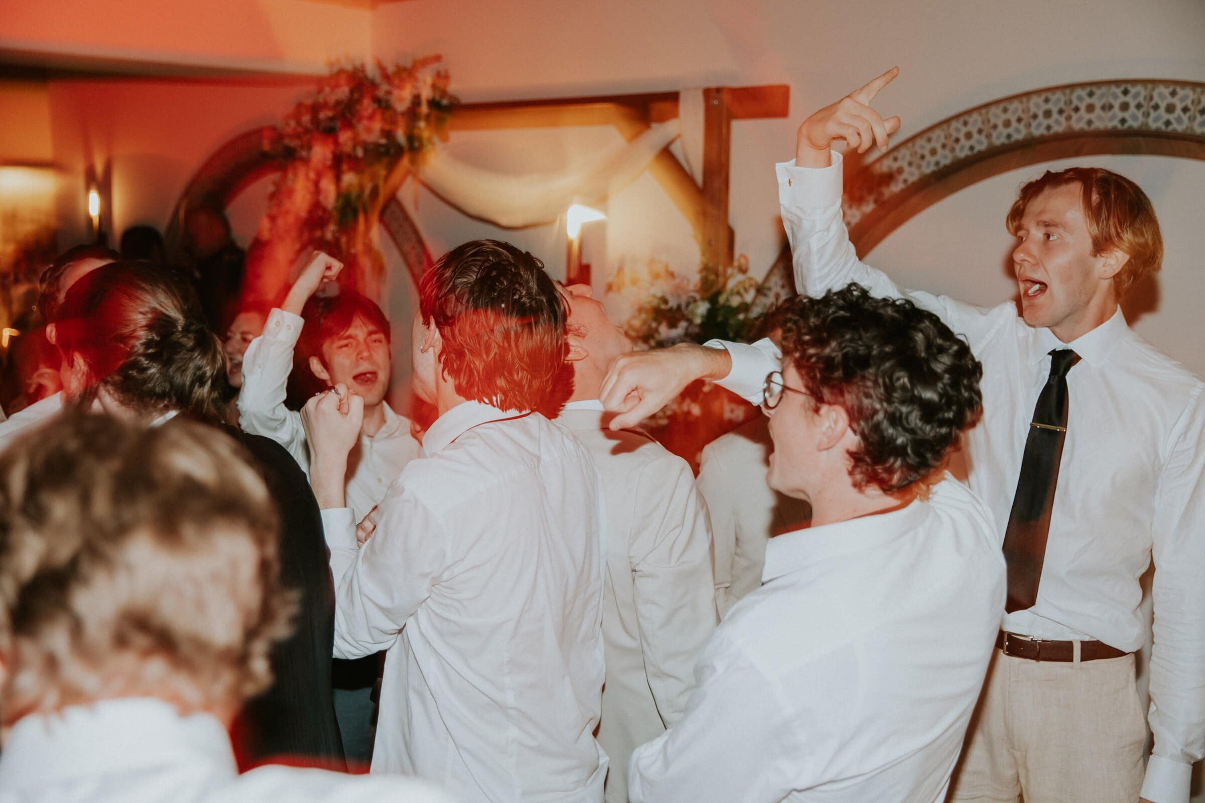 Friends singing along under red light