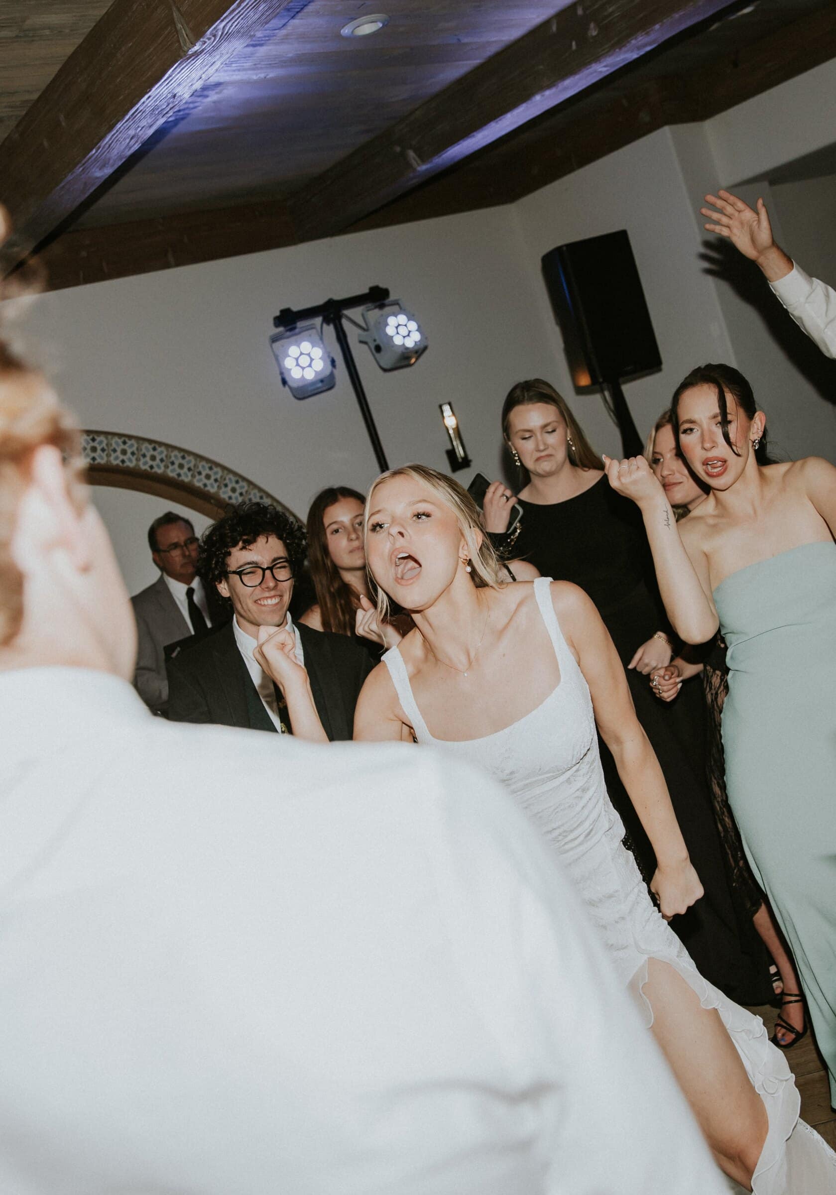 Leilani singing as she dances with her friends